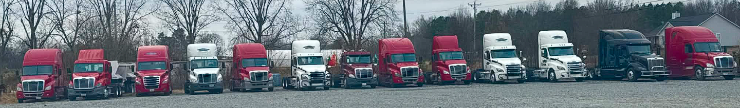 Lineup of Gracious Hope freight trucks